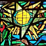 Glasfenster hinter dem Altar:
Sonnengesang des Hl. Franz von Assisi von Josef Seger (*1908 in Alt-Karlsthal/Schlesien, †1998 in Wien), akadem. Maler und Graphiker